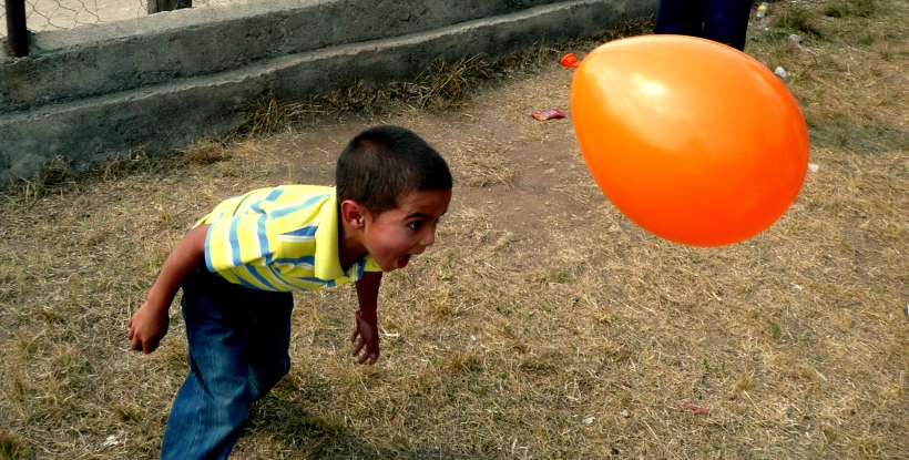 kid with balloon